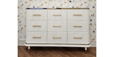 Photo from the object: chest of drawers with bronze mirror inserts